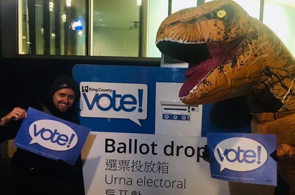 WHCA Voter Assistance Booth T-Rex and Treasurer Micah Phillips at Skyway Library King County Elections Drop Box